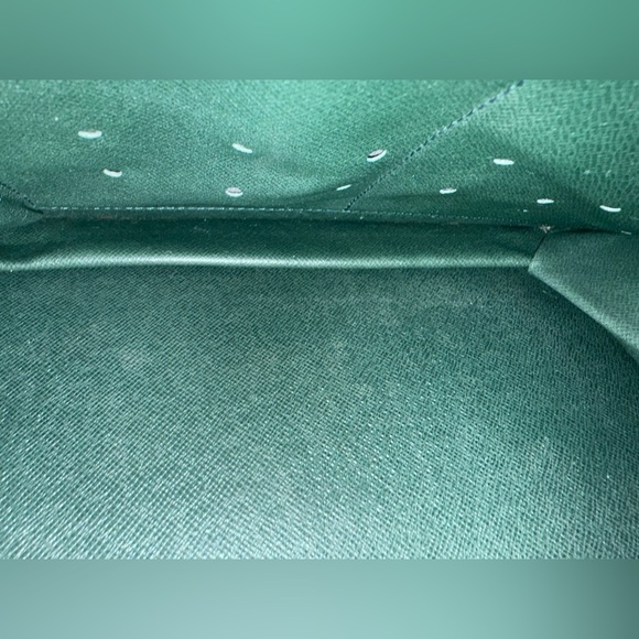 Louis Vuitton Tiaga Leather Clutch - Picture 5 of 12